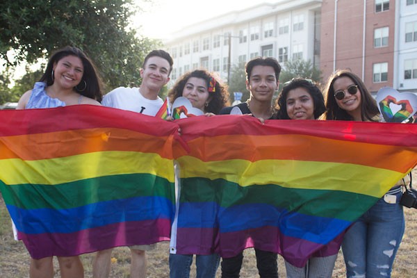Revelers at a previous Pride Month celebration show off their true colors. - Julian Ledezma