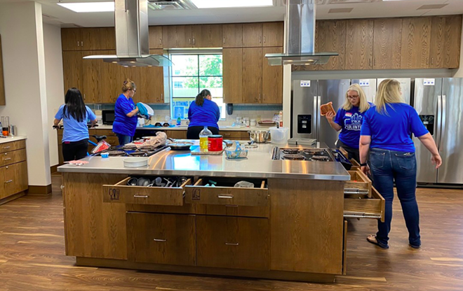 Volunteers do work at a San Antonio Ronald McDonald House facility. - Facebook / Ronald McDonald House Charities of San Antonio, Texas