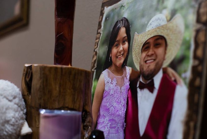 A photo in Garza’s home of him with his daughter, Amerie Jo. - Texas Tribune / Evan L'Roy
