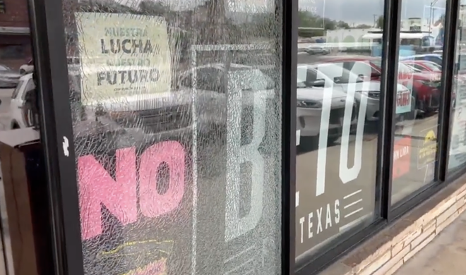 A window at the Bexar County Democratic Party headquarters was shattered when a suspect discharged a firearm at the building early Tuesday morning. - Twitter / Joey Palacios