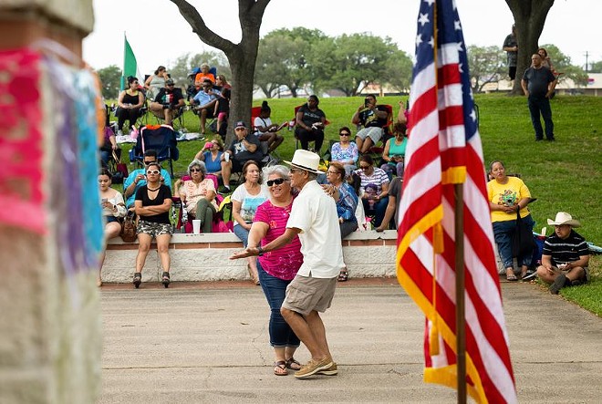 Josie and Santos Ramos dance during a Cinco de Mayo parade and festival on April 30. The couple have been married for 49 years and raised their family in Texas City. - Texas Tribune / Annie Mulligan