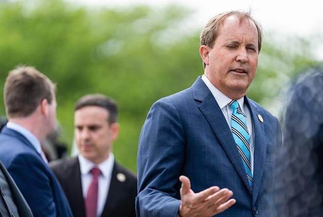 Texas Attorney General Ken Paxton speaks during a press conference at the U.S. Supreme Court in April. - Texas Tribune / Eric Lee