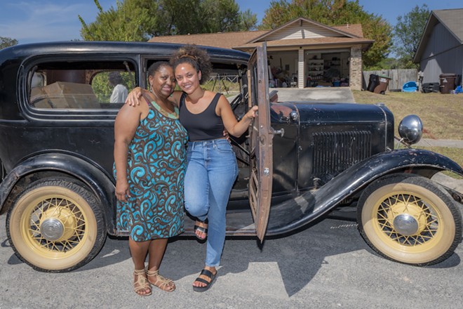 Members of the McKinney family show off the 1932 Ford Model B heading to the Smithsonian. - Photo by Al Rendon, courtesy of the National Museum of American History
