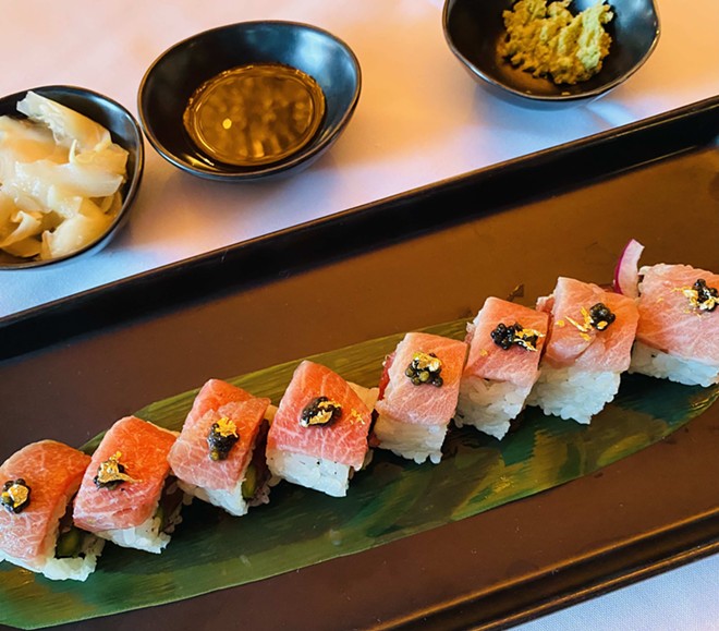 Gold foil and caviar appear multiple places on the Up Scale menu, including on this sushi roll. - Ron Bechtol