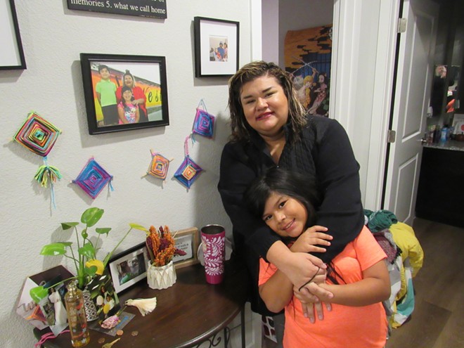 Janet Garcia and her family flourished once they were able to move into affordable housing. However, other families are still on waiting lists. - Sanford Nowlin