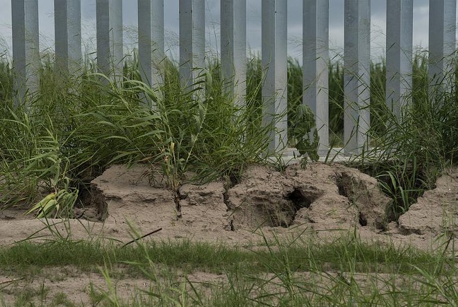 Erosion can be seen along a privately funded border wall in Mission in June 2020. - Texas Tribune and ProPublica / Verónica G. Cárdenas