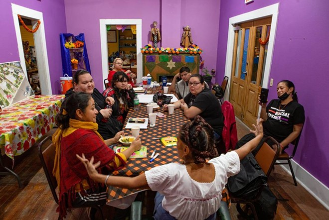 Members of Esperanza Peace and Justice Center meet biweekly at the Rinconcito de Esperanza, the organization’s cultural hub. - Texas Tribune / Azul Sordo