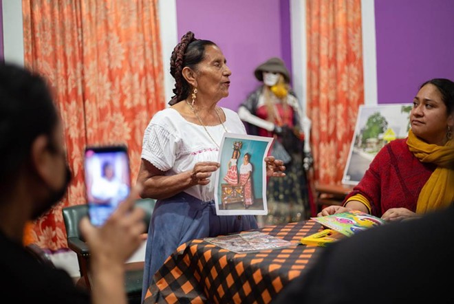 Irene Aguilar, a traditional ceramic artist from Oaxaca, Mexico, speaks at a meeting hosted at the Rinconcito de Esperanza on Nov. 30. - Texas Tribune / Azul Sordo