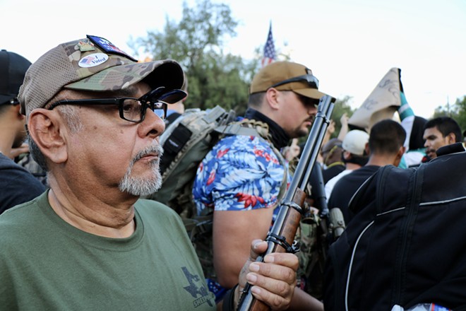 Armed members of This Is Texas Freedom Force position themselves at the Alamo during a May 2020 BLM protest. - James Dobbins