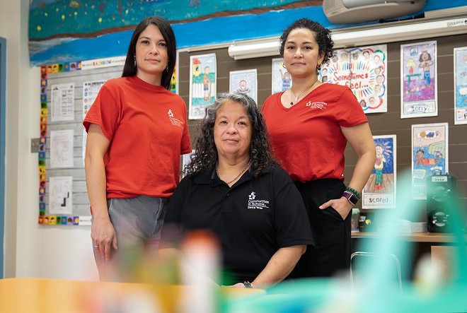 From left: Communities in Schools staff members Christy Mitchell, Dorothy Garza and Amara Nitibhon at Langford Elementary School in Austin on Feb. 14. - Texas Tribune / Montinique Monroe