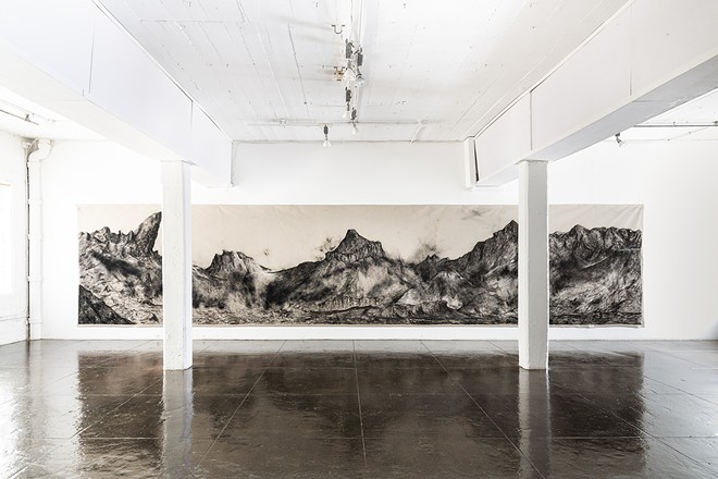 Nohemi Pérez uses charcoal in her work as a reference to mining and the exploitation of both natural resources and the labor used to excavate it. - Beth Devillier