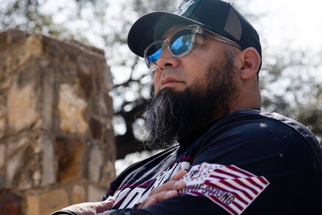 Ruben Torres, whose daughter, Khloie, was wounded in the Robb Elementary shooting, served as a Marine infantryman in Iraq and Afghanistan. He has no objection to civilians owning AR-15s but thinks they should be required to complete training like soldiers do. - Texas Tribune / Evan L'Roy
