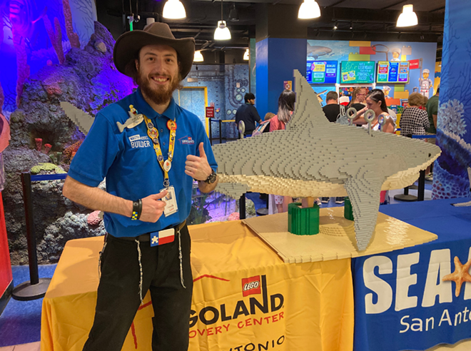 Kevin Hintz, who built the lego shark, stands with his creation inside Legoland Discovery Center San Antonio. - Courtesy / Legoland Discovery Center San Antonio