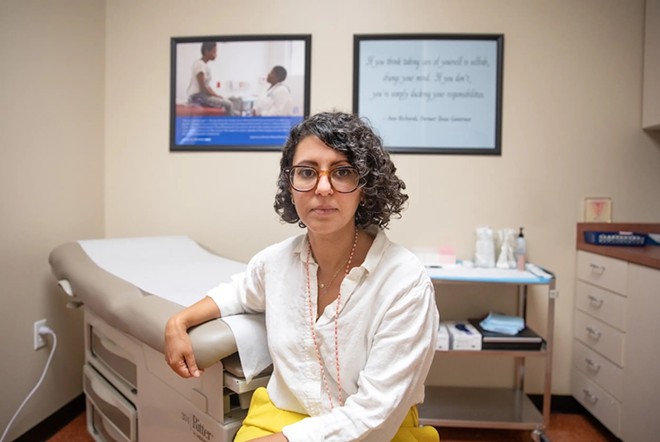 Dr. Amna Dermish, chief operating and medical services officer for Planned Parenthood of Greater Texas, poses for a portrait in an exam room of a Planned Parenthood facility in Austin on Aug. 8, 2023. Credit: Montinique Monroe for The Texas Tribune - Texas Tribune / Montinique Monroe