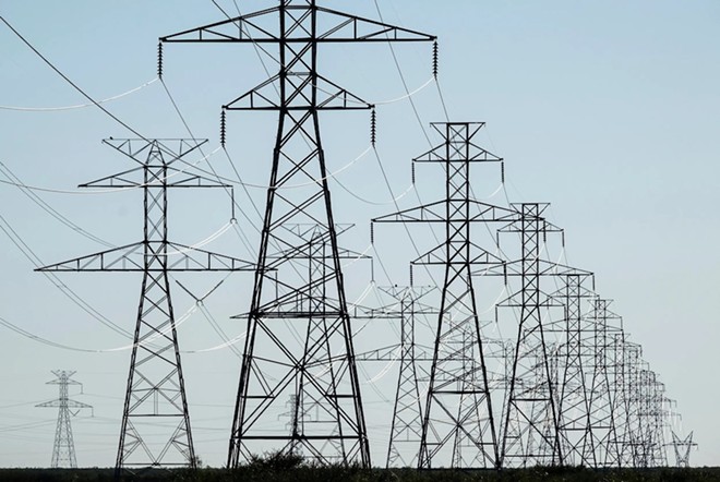 Power lines crisscross the Permian Basin landscape south of Gardendale in 2018. - Texas Tribune / Jerod Foster