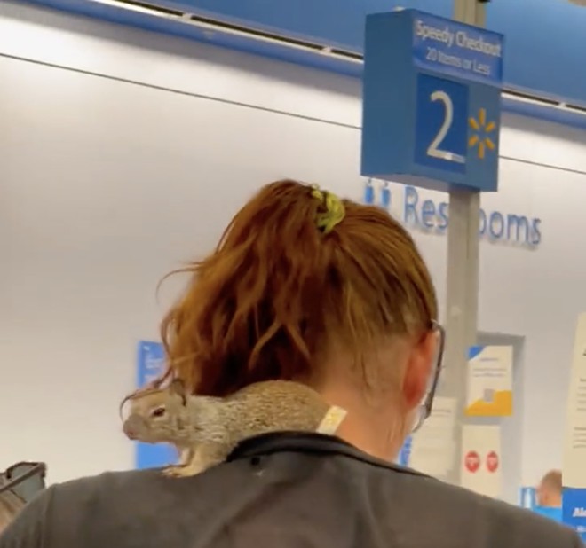 This woman and her squirrel friend were spotted last week at the Walmart location at 5555 De Zavala Road. - X / @BarstoolUTSA