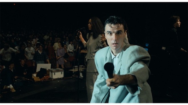 David Byrne in the rare suit that absolutely deserves the adjective “iconic.” - Courtesy Photo / A24 - Joden Croneweth