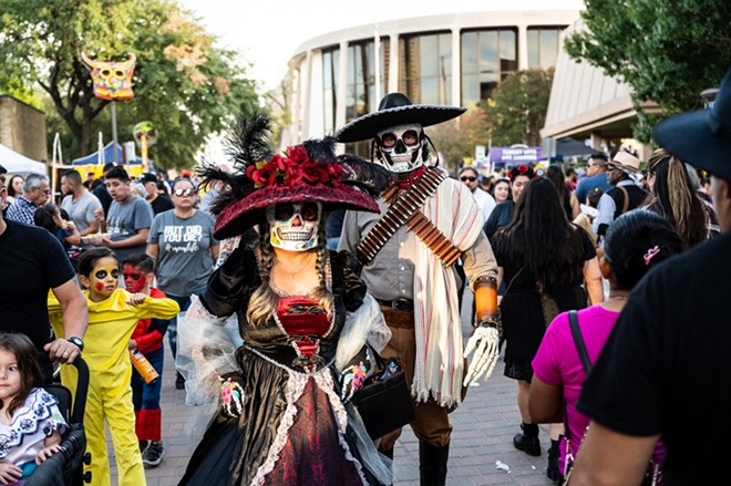 Attendees of a previous Muertos Fest show off their elaborate garb. - Jaime Monzon