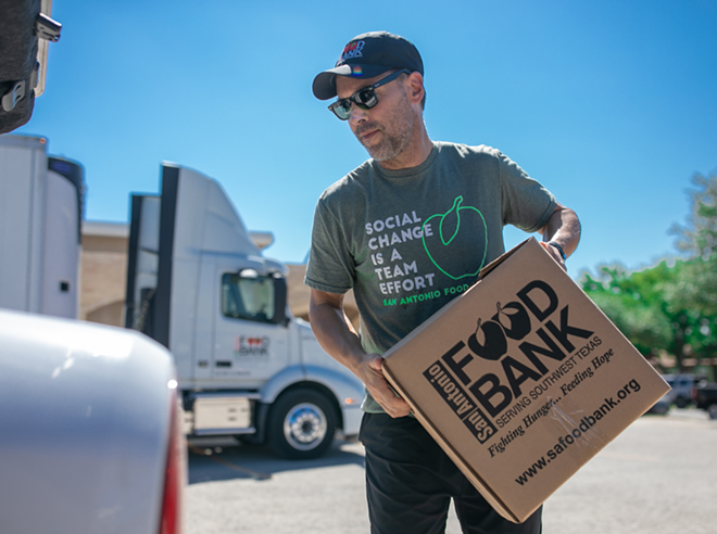 Food Bank CEO Eric Cooper loads a food box into a vehicle in Uvalde, Texas. - Courtesy Photo / San Antonio Food Bank