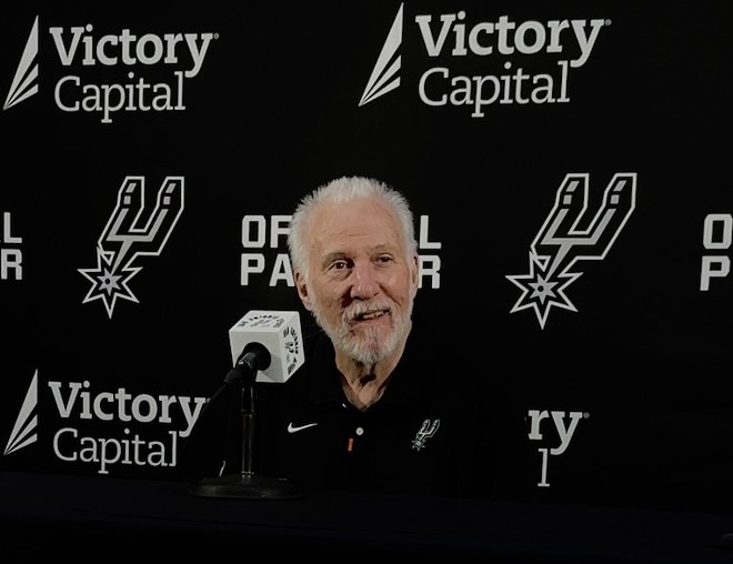 San Antonio Spurs head coach Gregg Popovich speaks to reporters during the team's media day prior to the start of the season. - Meredith Garcia