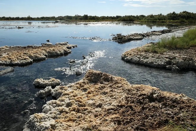 For years, produced water has bubbled up to the surface from an abandoned well near Imperial. Known as Lake Boehmer, the site is encrusted with salt crystals and high levels of hydrogen sulfide. - Inside Climate News / Martha Pskowski