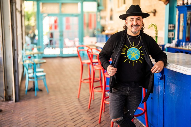 San Antonio chef Rico Torres shows off Family Meal-branded apparel. - TxTroublemaker