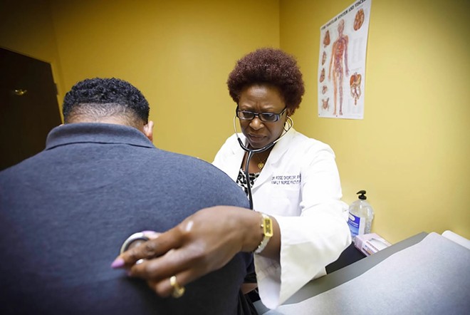 Dr. Rose Okoro, a nurse practitioner, who owns Daystar Family Clinic in Katy, is shown on May 12. 2014. She says she has struggled to treat a greater number of Medicaid patients because of state regulations. - Michael Stravato