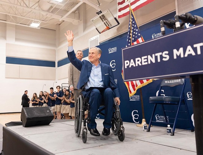 Gov. Greg Abbott waves to the crowd during a Houston stop on his tour to drum up support for school vouchers. - Instagram / governorabbott