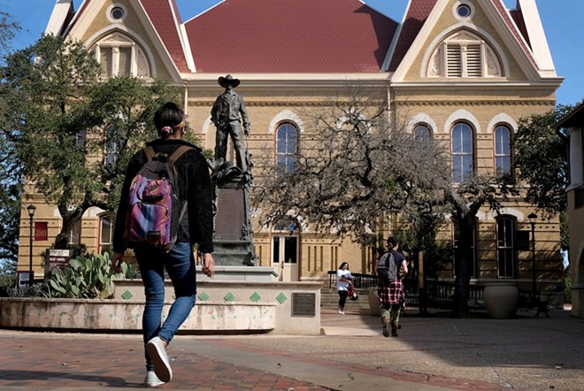 Students walk through Texas State University campus in San Marcos on Jan. 31, 2018. - Texas Tribune / Laura Skelding