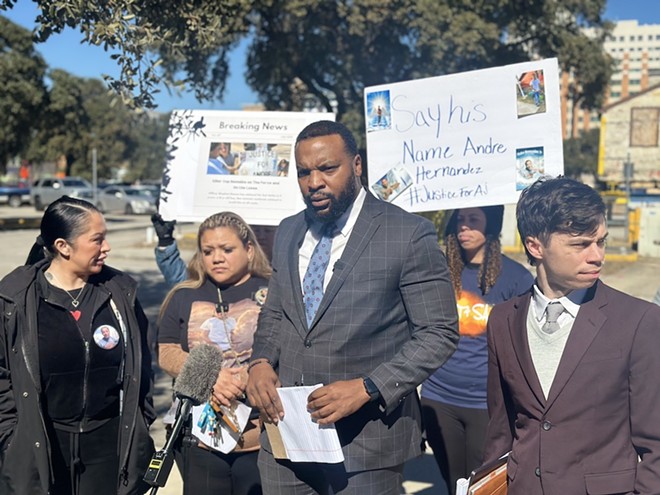 High-profile civil rights attorney Lee Merritt speaks to reporters gathered outside San Antonio's federal courthouse Wednesday. - Michael Karlis
