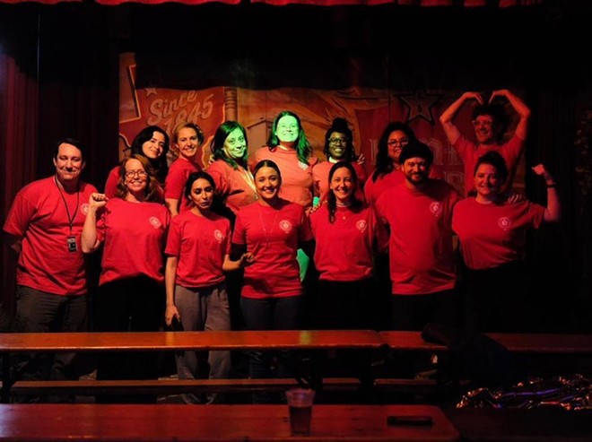 Workers at the San Antonio Report show off their new union T-shirts. - Courtesy Photo / San Antonio Report Union