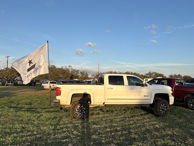 A Come and Take It flag flutters from a "Take Our Border Back" convoy member's truck Thursday in Dripping Springs. - Michael Karlis