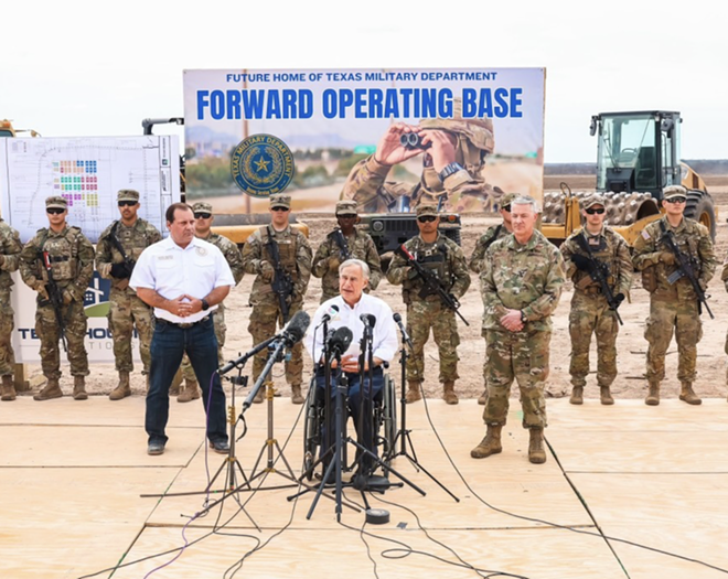 Gov. Greg Abbott enjoys another border photo op. This time with lots of guns. - Courtesy Photo / Office of the Governor