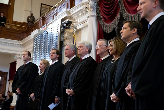 Texas Supreme Court Justice John Devine, far left, with fellow judges on the House floor in Austin in 2013. - Texas Tribune / Bob Daemmrich