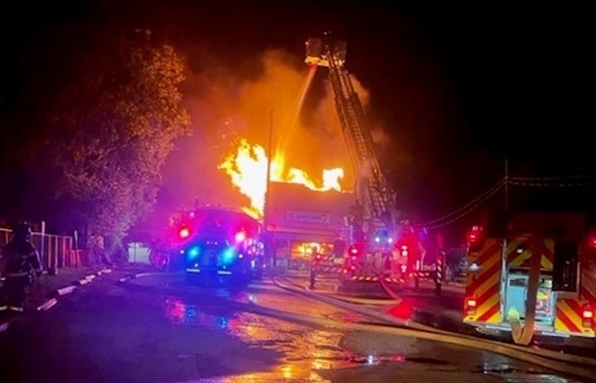 Emergency crews battle the Nov. 14 blaze at Cancun Mexican Restaurant. - Facebook / City of New Braunfels Fire Department