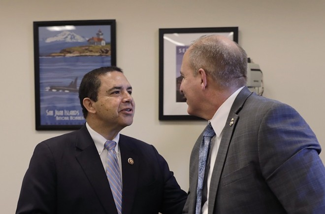 Rep. Henry Cuellar, left, greets a U.S. Customs and Border Protection in Washington ahead of a 2020 hearing. - Wikimedia Commons / U.S. Customs and Border Protection