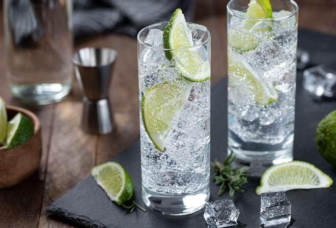 A gin and tonic is always better when made with high-quality, juniper-forward gin. - Shutterstock / Charles Brutlag