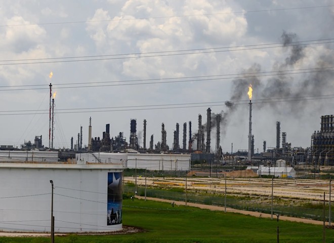 A 2019 fire at the Exxon Mobil chemical plant in Baytown, Texas, injured dozens of workers. Over the objections of environmentalists, the plant is seeking permission to expand, a dispute likely to wind up in the new 15th Court of Appeals. - Shutterstock / michelmond