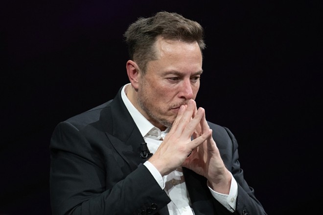 Elon Musk puts on his "deep thinker" face at a technology conference last year in Paris. (That's France, not Texas.) - Shutterstock / Frederic Legrand - COMEO