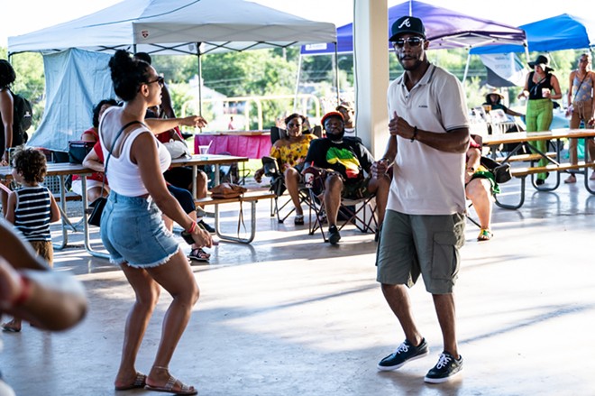 People dance to the music at 2023's San Antonio Reggae Festival. - Jaime Monzon