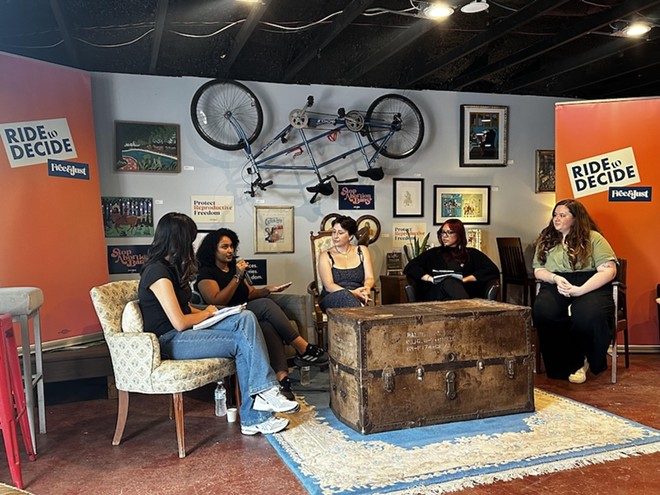 Abortion-rights advocates speak during the Ride to Decide national bus tour's stop in San Antonio last month. - Michael Karlis