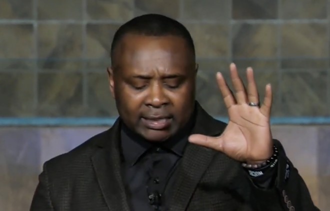 Terren L. Dames strikes a pose during a sermon when he was pastor at North Dallas Community Bible Fellowship. - YouTube Screen Capture / North Dallas Community Bible Fellowship