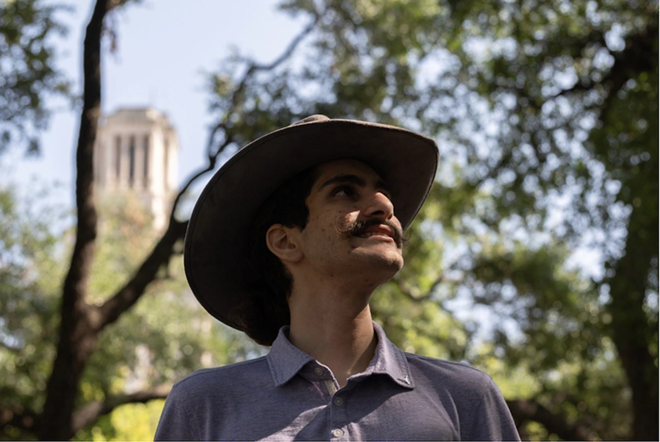 Arshia Papari stands below the UT Tower in Austin on Aug. 6, 2024 Papari, a rising sophomore is majoring in government. - Texas Tribune / Olivia Anderson