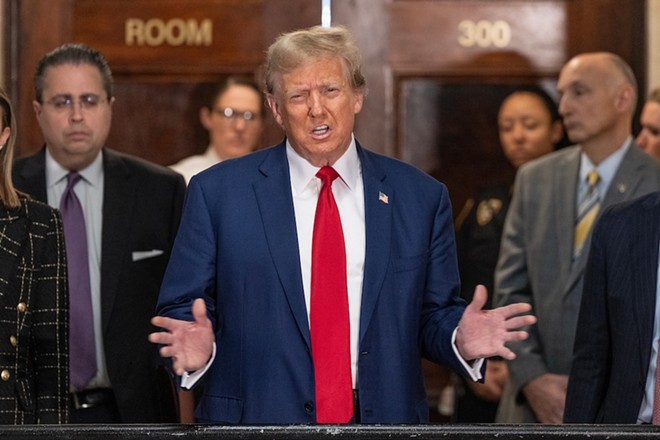 Former President Donald Trump speaks before closing arguments at his civil fraud trial early this year at the State Supreme Court of New York. - Shutterstock / lev radin