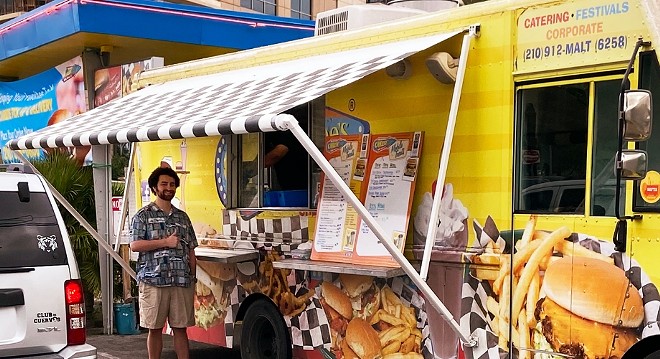 Owner Tirso Sigg poses in front of the food truck in 2020. – Photo courtesy of Cheesy Jane's