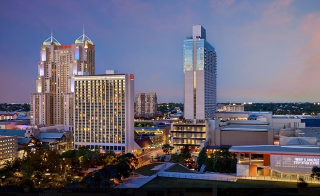 The Marriott River Center and Marriott Riverwalk hotels at dusk. - Courtesy of Marriott