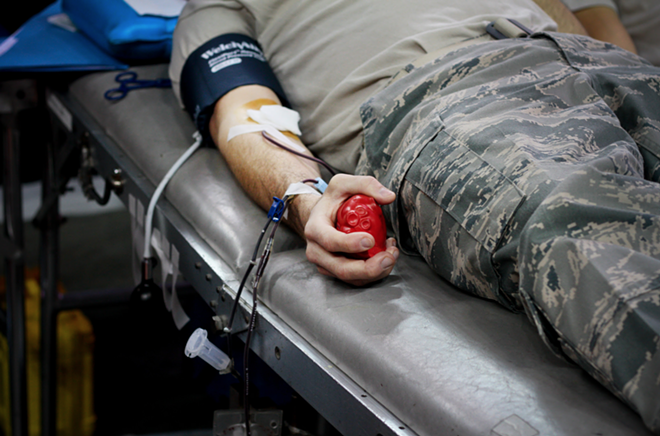 A service member donates blood. - Flickr/Matt Hecht