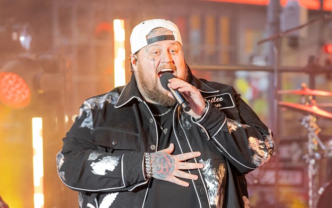 Jelly Roll performs on stage during 2024 New Year's celebration on Times Square in New York on December 31, 2023. - Shutterstock / lev radin