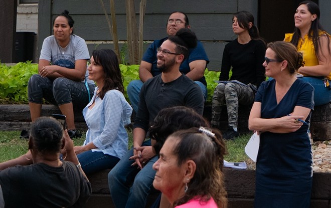 District 2 Councilman Jalen-McKee Rodriguez sits next to District 6 Councilwoman Melissa Cabello Havrda at Monday's tenants rally at the Soap Factory Apartments. District 5 Councilwoman Teri Castillo sits behind them. - Adam Doe