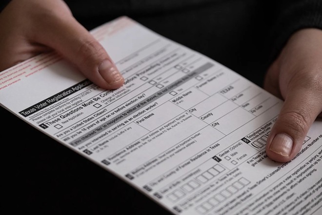 A voter registration card in 2022. The deadline to register to vote in this year's elections is Oct. 7. - Texas Tribune / May-Ying Lam